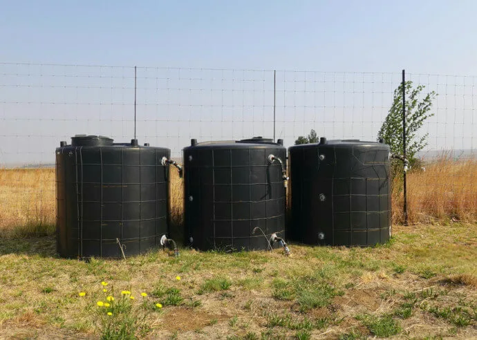 Water tanks in a field